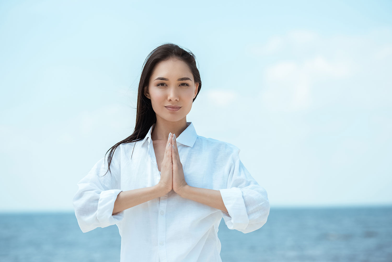 Garland Pose with Hands in Namaste