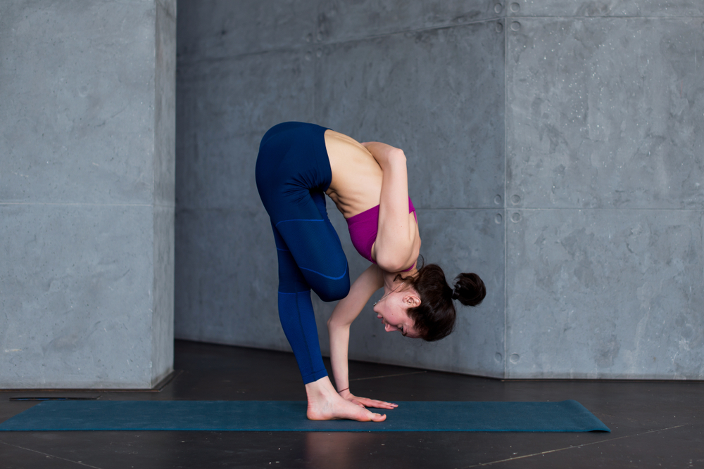 Ardha Baddha Padmottanasana - Half Bound Lotus Standing Pose