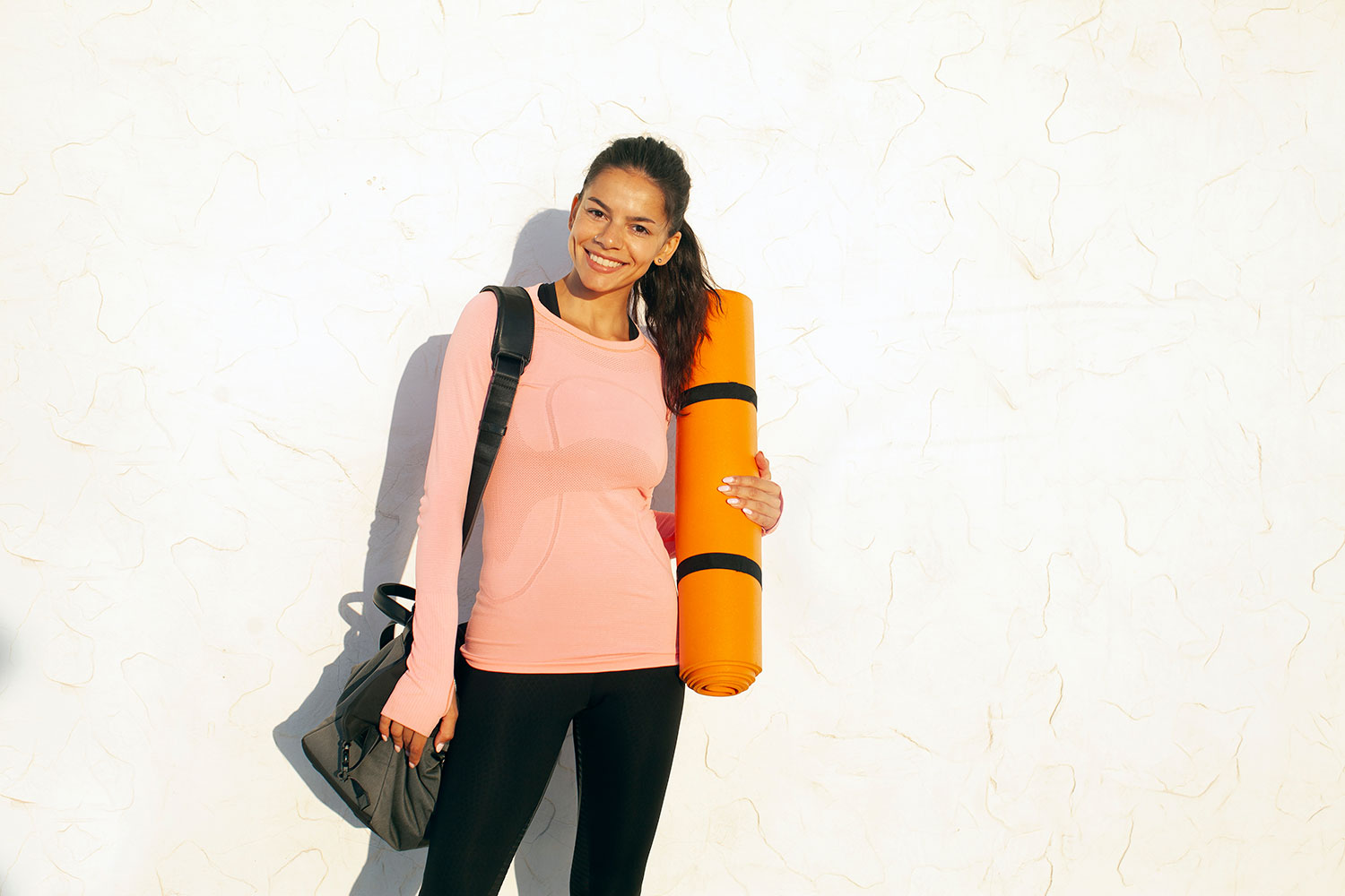 How to Use a Yoga Mat Strap for Easy Travel to and From Studio - YOGA  PRACTICE