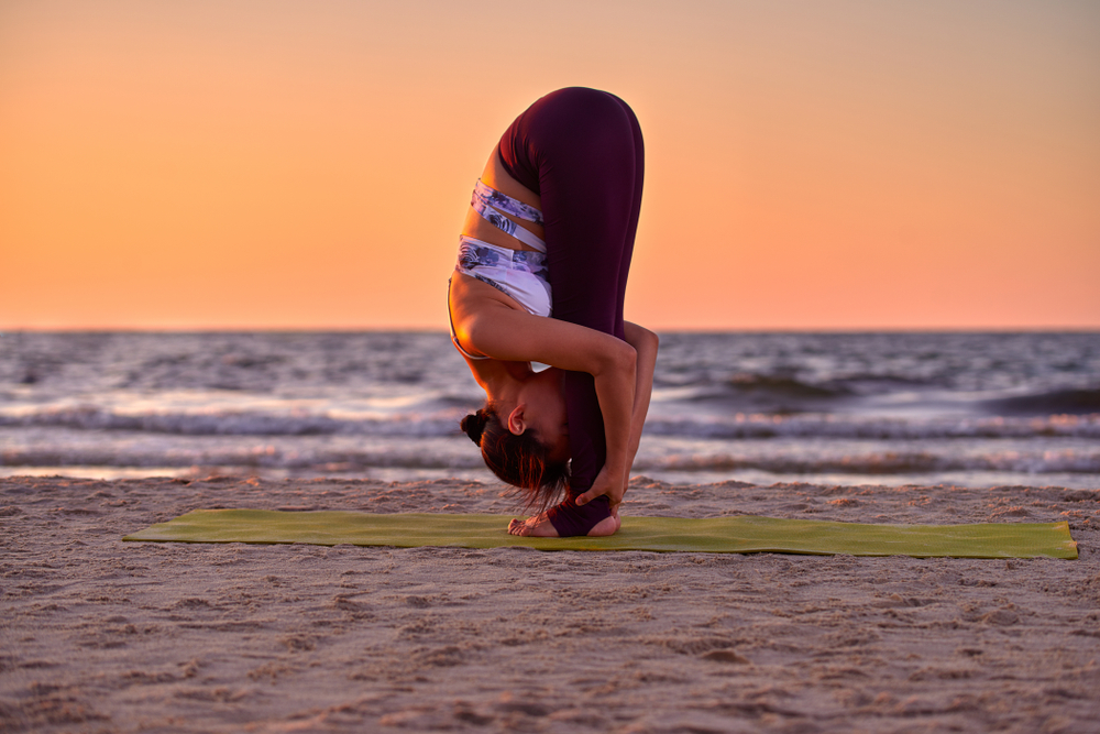 Stretching in Uttanasana