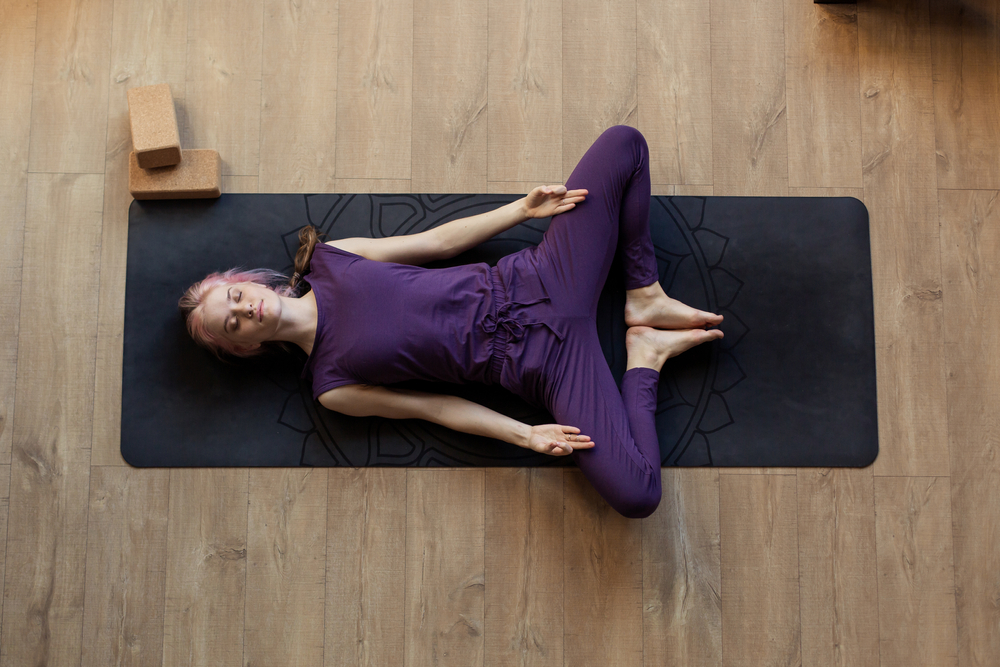 Supta Baddha Konasana — Reclined Butterly Pose